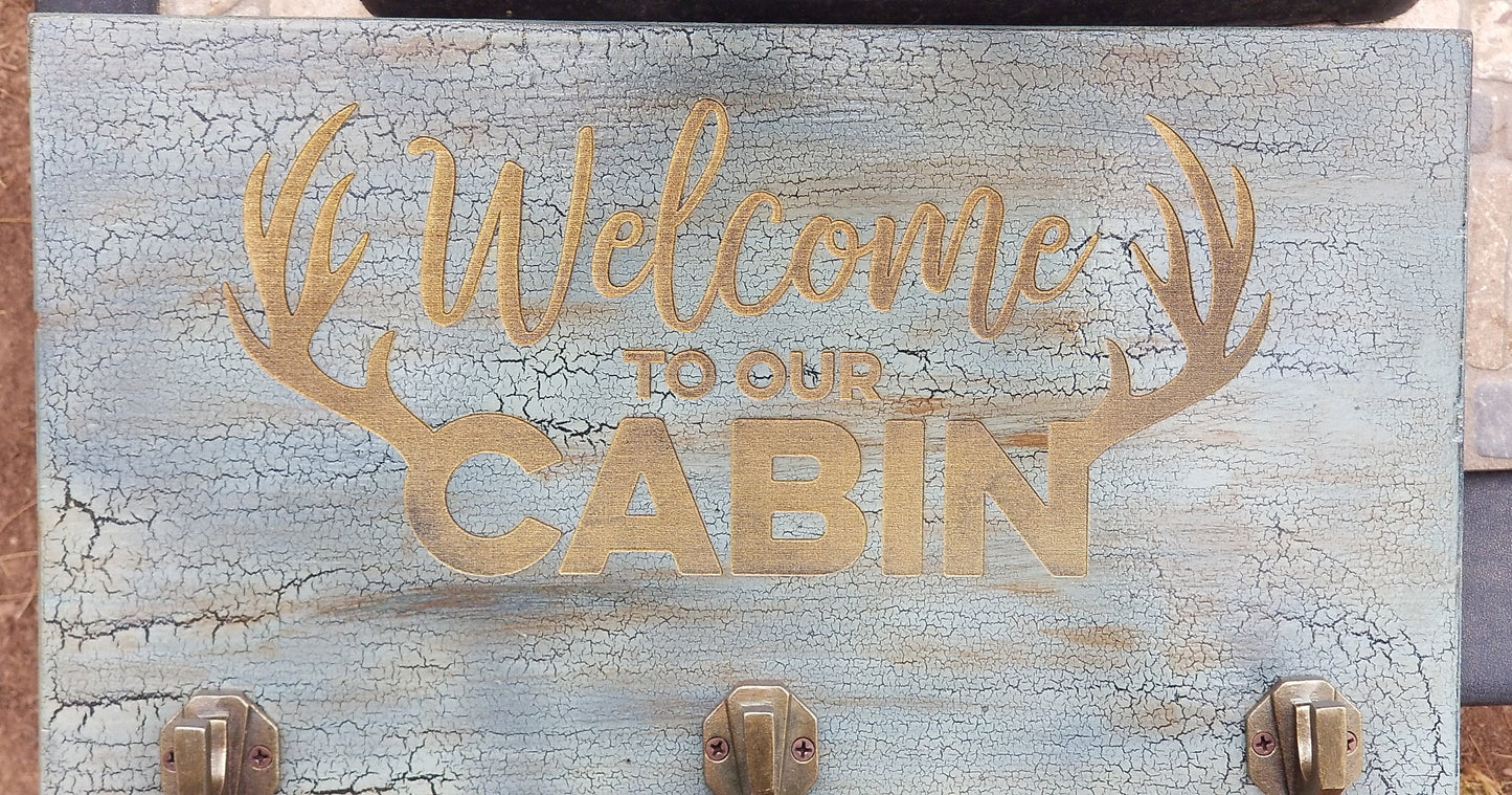 Welcome to our Cabin Coat Rack Engraved Distressed Wood, Distressed Coat Rack, Cabin Coat Rack, Coat Hook, Cabin Coat Hook, Antler Engraved